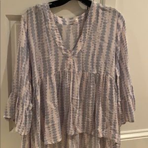 v neck longer in the back